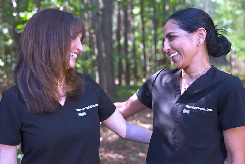 doctors smiling at eachother